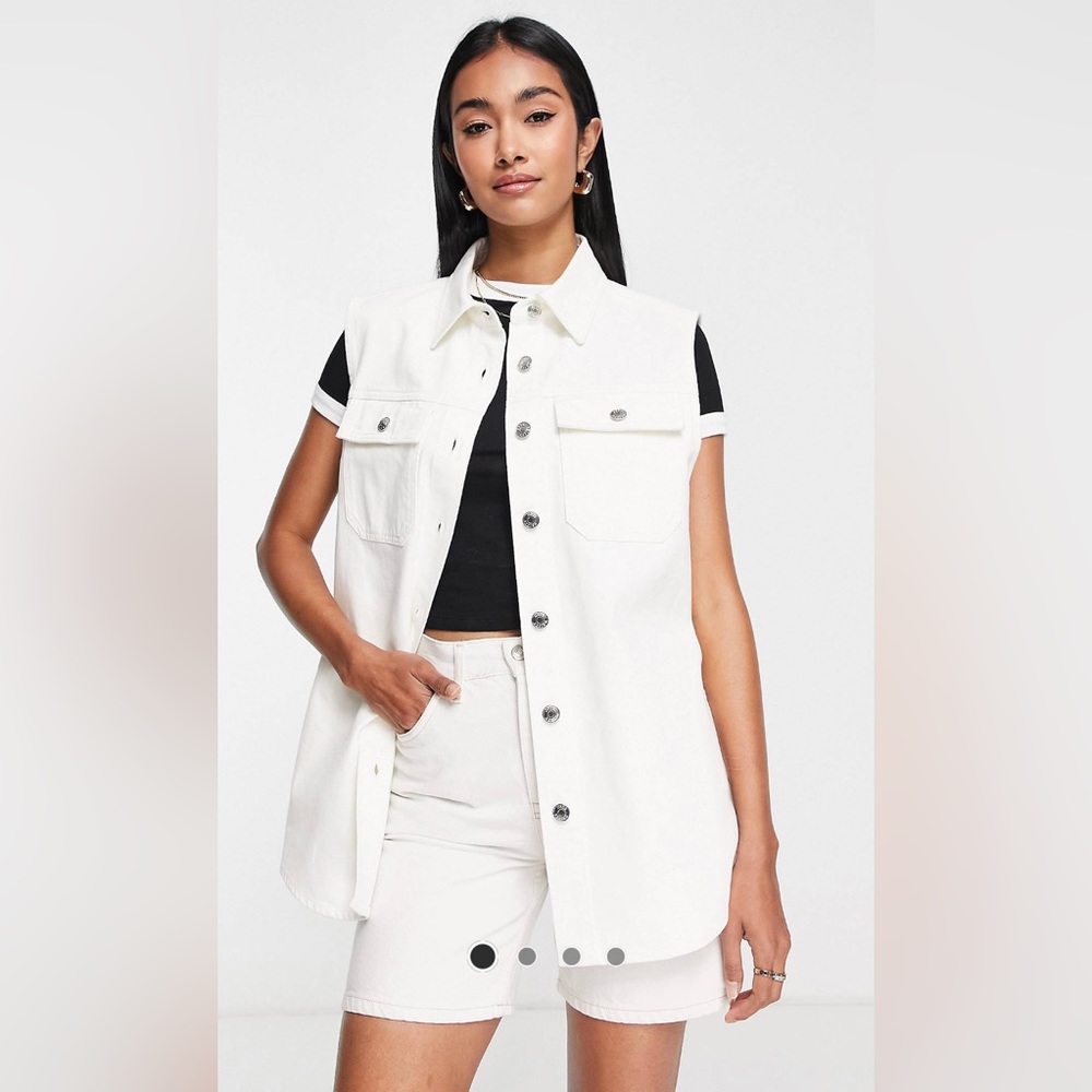 Sleeveless white denim jacket